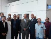 صور.. استقبال رحلة لحجاج عائدين من الأراضى المقدسة بمطار القاهرة