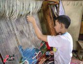 صورة اليوم.. بالخيوط والإبداع "السجاد اليدوى" رحلة تاريخ وفن