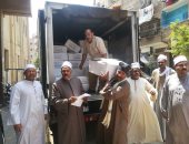 صور.. "أوقاف سوهاج" توزع 5 أطنان من لحوم صكوك الأضاحى على الفقراء
