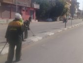 صور..حملة نظافة بطريق الجولى فيل بالأقصر والمحافظ يتفقد شارع خالد بن الوليد