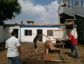 حملة لإزالة إشغالات أكشاك شارع السودان بالعجوزة وأخرى للأبنية المخالفة..صور