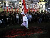 صور.. العراقيون يحتفلون بيوم عاشوراء وسط تكثيف أمنى