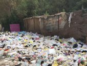 تراكم القمامة بأحد شوارع مدينة نصر.. صور