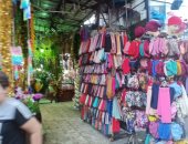 صور.. "زنقة الستات" أشهر سوق للسيدات متخصص فى الأقمشة بالإسكندرية