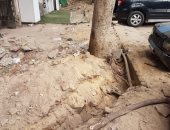 قارئ يشكو وجود كابل كهرباء نتيجة أعمال حفر دون ردمه بشارع الثورة فى الدقى