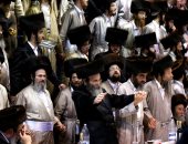 اليهود الأرثوذكس يحتفلون بعيد بهجة التوراة في القدس