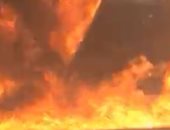 قارئة تشارك بصور لحريق فى مصنع بالطريق الصحراوى بالإسكندرية