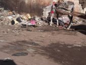 قارئ يشكو من انتشار القمامة فى ميدان رئيسى بمحافظة سوهاج