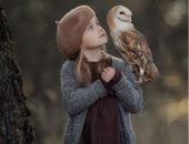 مصورة روسية تظهر علاقة الأطفال بالحيوانات والطيور فى لقطات مذهلة.. صور