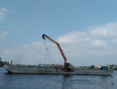 "البيئة" تشارك فى حملة إزالة الأقفاص السمكية من نهر النيل بالبحيرة صور