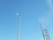 قارئ يرصد إضاءة أعمدة الإنارة نهارا بمنطقة سوق السيارات فى مدينة نصر