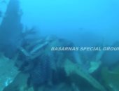 صور.. فريق الإنقاذ الإندونيسى يعثر على حطام الطائرة المنكوبة بقاع البحر