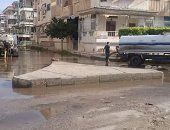 رفع تجمعات مياه الأمطار من شوارع رأس البر