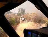 قوات أمريكية خاصة فوق تلال كاليفورنيا أثناء حرائق الغابات.. تعرف على السبب