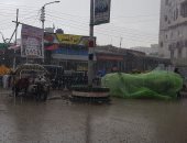 صور.. استمرار  هطول الأمطار بمدن الدقهلية والشوارع تتحول لبرك من المياه