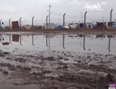 شاهد.. الأمطار الغزيرة تعزل 5 آلاف خيمة بمخيم الموصل فى العراق عن العالم