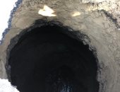 صور.. هبوط أرضى أمام قرية شاوه بالمنصورة بعمق 5 أمتار وتحويل حركة المرور