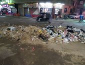 قارئ يشكو انتشار القمامة بشارع المطرواى فى المطرية