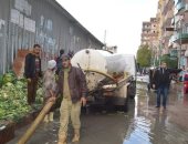 صور.. غرق شوارع مطوبس ودسوق تحت الأمطار وعمال مجالس المدن يرفعون المياه