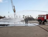 مناورة مكافحة حريق بساحة الأبلاكاش بميناء دمياط