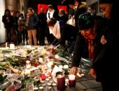 شموع وزهور فى ستراسبورج الفرنسية تكريما لضحايا الهجوم الإرهابى