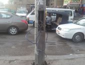 قارئ يشكو خروج اسلاك كهرباء من أحد الأعمدة بمدينة نصر
