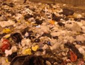 قارئ يشكو انتشار القمامة أسفل الدائرى اتجاه أحمد عرابى