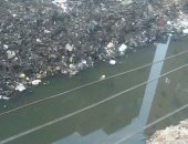 شكوى من تراكم القمامة على جانبى الترعة فى منطى بالقرب من دائرى أم بيومى