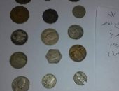 جمارك مطار برج العرب تضبط محاولة تهريب كمية من العملات الأثرية