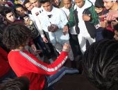 شباب الحديقة الدولية يتسابقون فى الرقص على أنغام الأغانى الشعبية