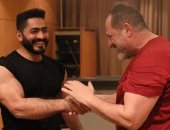 صور.. تمرينات قاسية بين تامر حسنى وخالد الصاوى بسبب "كل سنة و أنت طيب"