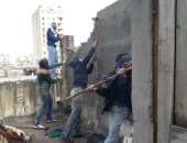 صور .. تنفيذ 5 قرارات إزالة لعقارات مخالفة وسط الأسكندرية 