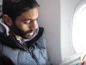 شاهد.. القرآن ولعبة "pubg" على متن طائرة الأهلي في رحلة الجزائر