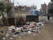 "حرق القمامة" وسيلة أهالى طنطا للتخلص من تراكم النفايات بشوراع المدينة