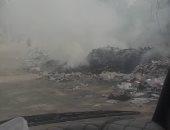 قارئ يشكو انتشار القمامة وتصاعد الأدخنة بمحطة الجراج فى جسر السويس