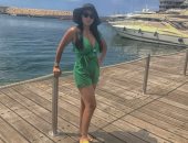 بعد خروجها من النيابة نشرت صورها ع البحر..رانيا يوسف تظهر بـ"شورت" أخضر