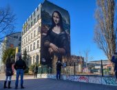 من اللوفر إلى برلين.. نسخة عملاقة للوحة "الموناليزا" تزين جدارا بألمانيا