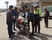 تحرير 2594 مخالفة لقائدى الدراجات النارية لعدم ارتداء الخوذة