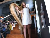 ربانزل أوكرانيا.. فتاة تسعى لدخول موسوعة جينيس بلقب أطول شعر فى العالم ..صور