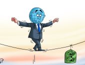 الكرة الأرضية تمشى على خط للوصول إلى الأمن والأمان فى كاريكاتير اليوم السابع