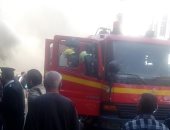 قارئ يشارك بصور لاندلاع حريق داخل محل فى روض الفرج