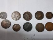 جمارك مطار برج العرب تضبط محاولتى تهريب عملات معدنية أثرية 