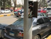 شكوى من خروج أسلاك كهرباء من أحد الأعمدة بشارع كورنيش العجوزة