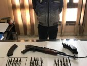 ضبط مسجل خطر بحوزته بندقية الية وطلقات نارية بالمحلة
