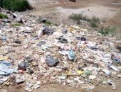 شكوى من انتشار القمامة بشارع العشرين فى فيصل