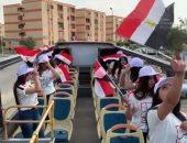 فيديو.. مواطنون يحتفلون بأتوبيسات مكشوفة بالتجمع للحث على المشاركة بالاستفتاء