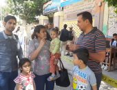 صور.. زوجين من الصم والبكم بأسيوط: نزلنا علشان نستكمل مسيرة التنمية