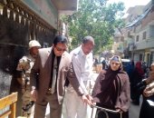 صور.. سيدة بالعياط تحرص على المشاركة بالاستفتاء على تعديل الدستور رغم إعاقتها