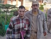 "أحمد" يتحدى إعاقته ويصوت فى آخر أيام الاستفتاء على الدستور فى دمياط