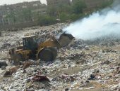 أهالى شارع مجمع المصانع بالزاوية الحمراء يشكون من حرق القمامة